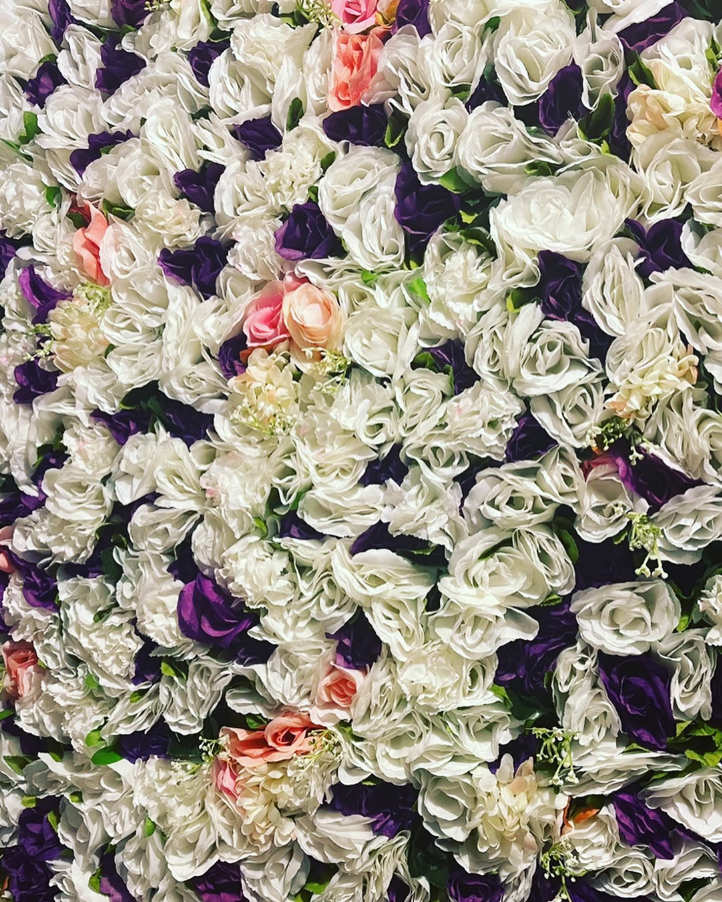 Dense white, cream and pink faux rose flower wall panel