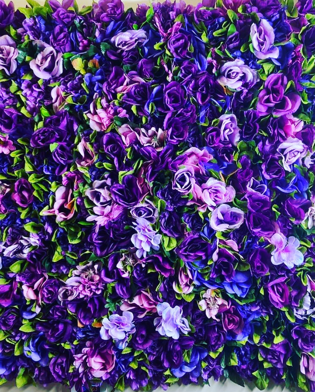 Dense purple, blue and lavender faux rose flower wall panel